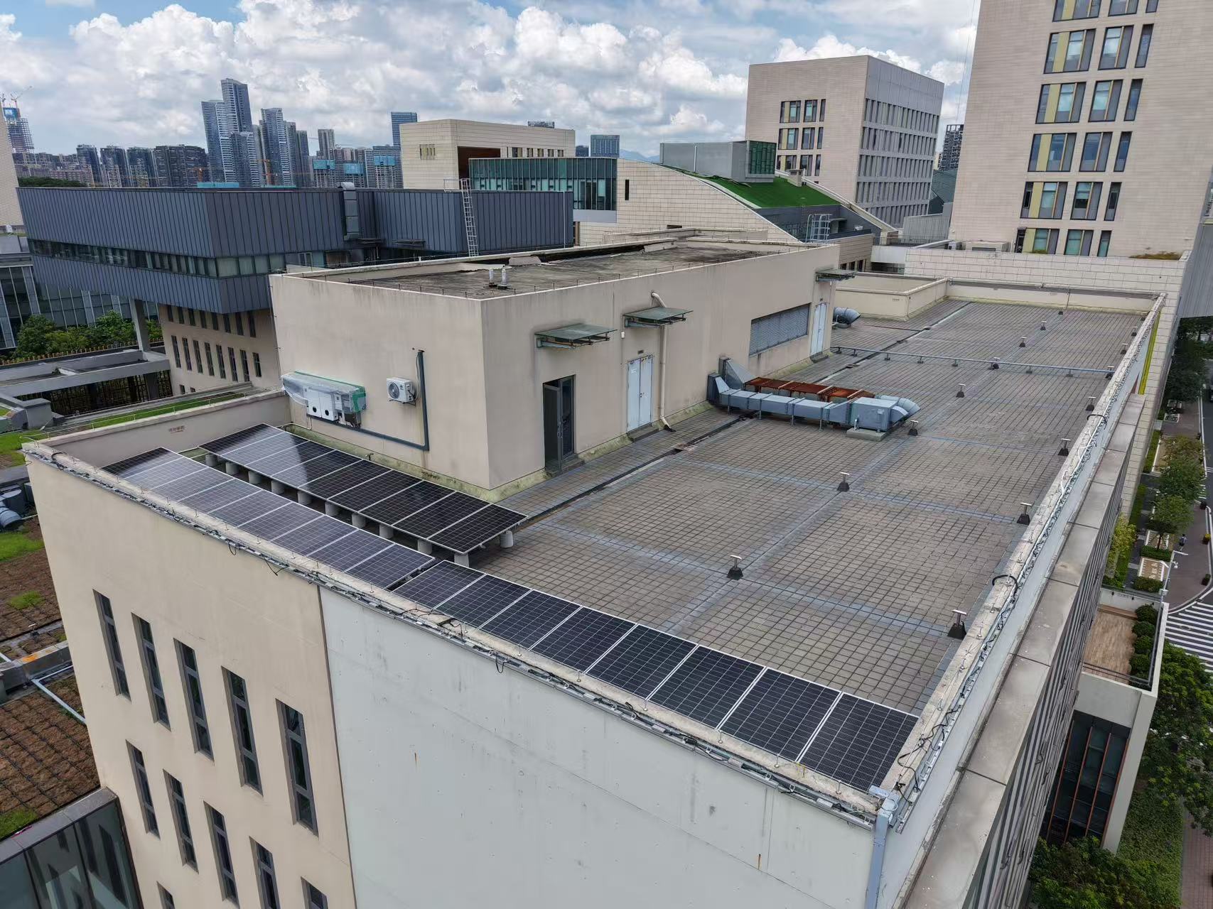 Campus building with PV panels and Shenzhen skyline